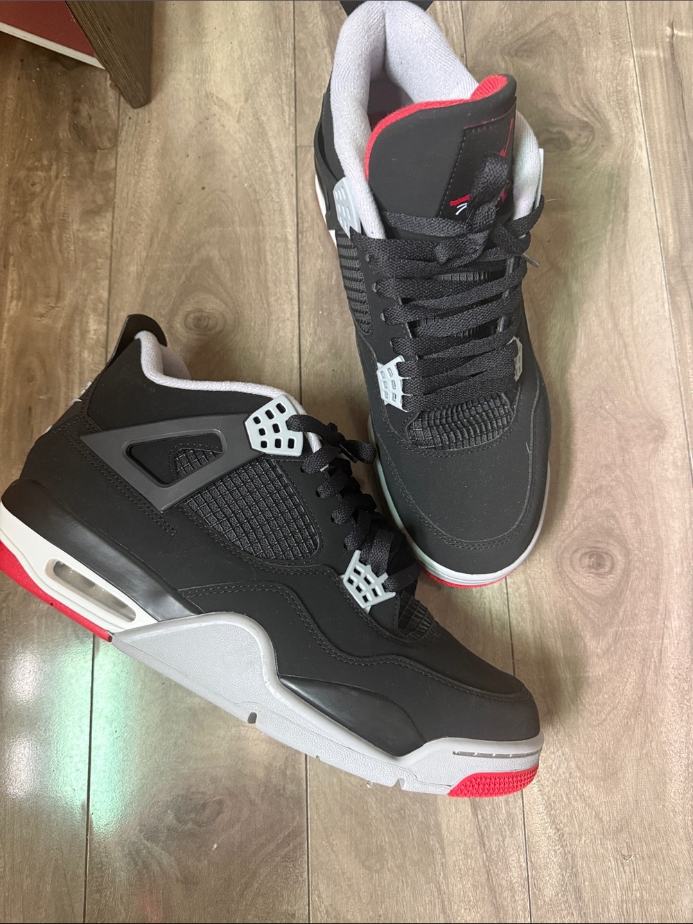 Jordan 4 Men’s Black and Red Retro Basketball Sneakers